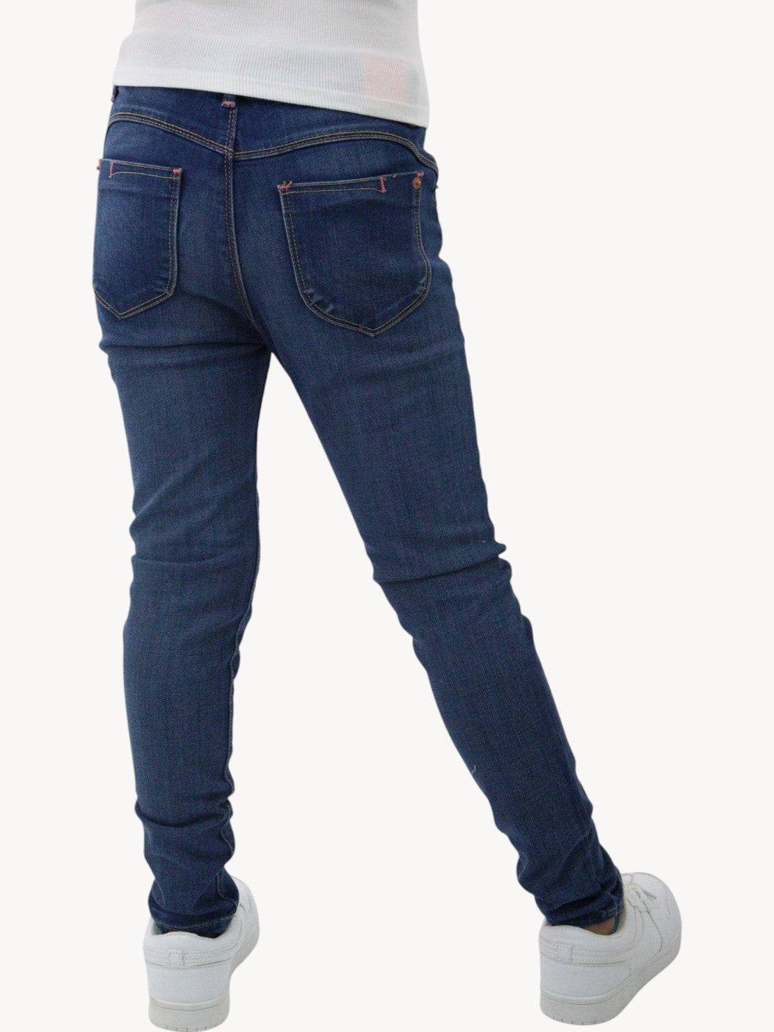 Jeans skinny con colgante decorativo