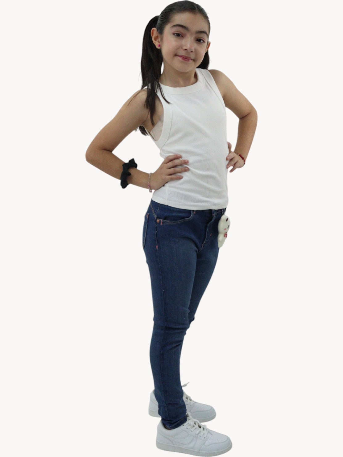 Jeans skinny con colgante decorativo