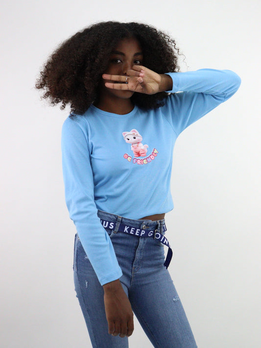 Playera manga larga de color azul con estampado de gato