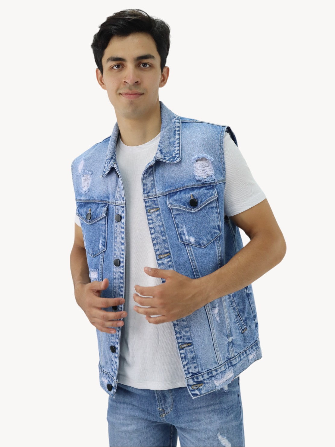 Chaleco denim de color azul medio con destrucción