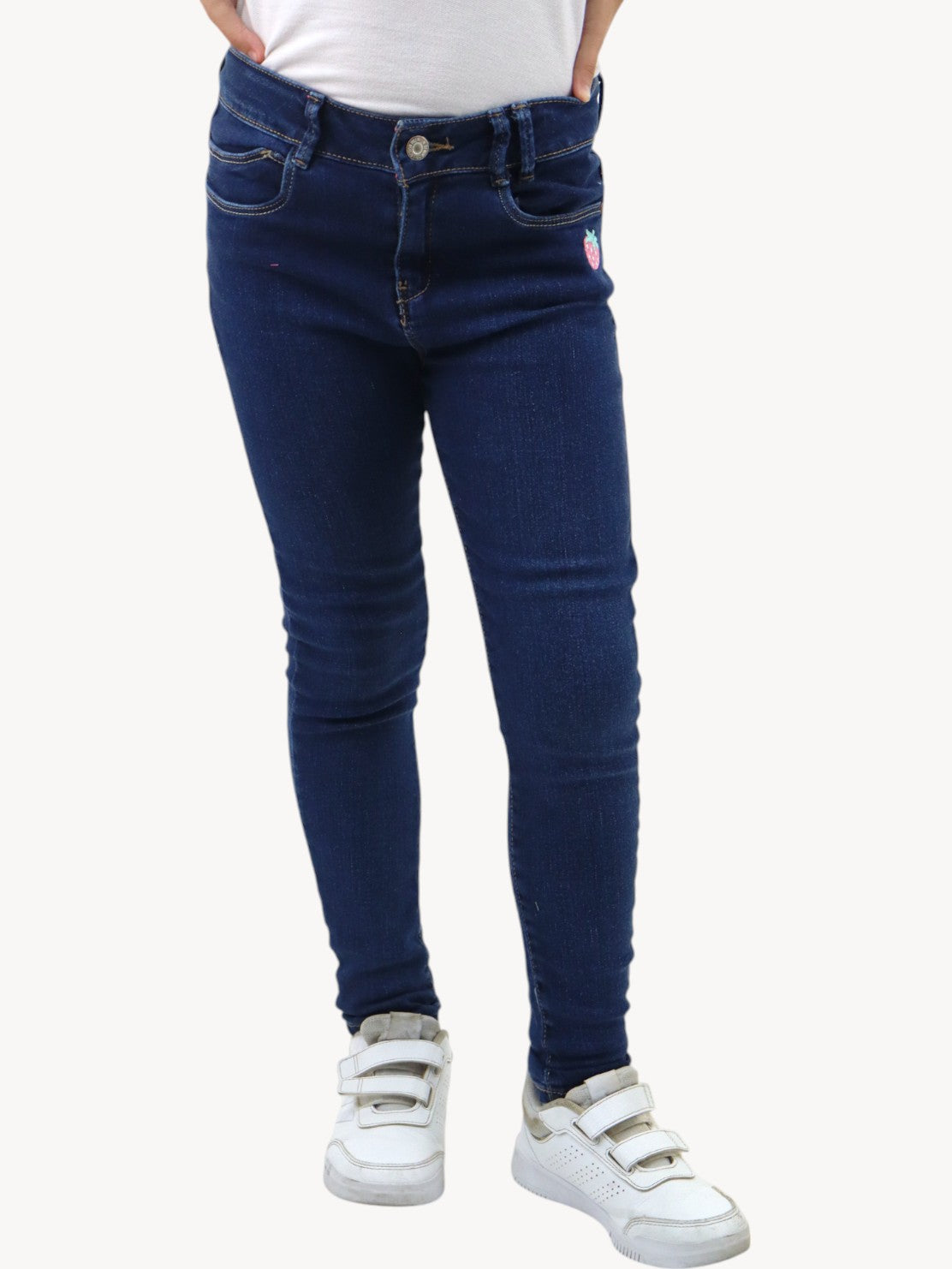 Jeans skinny con bordado de fresa
