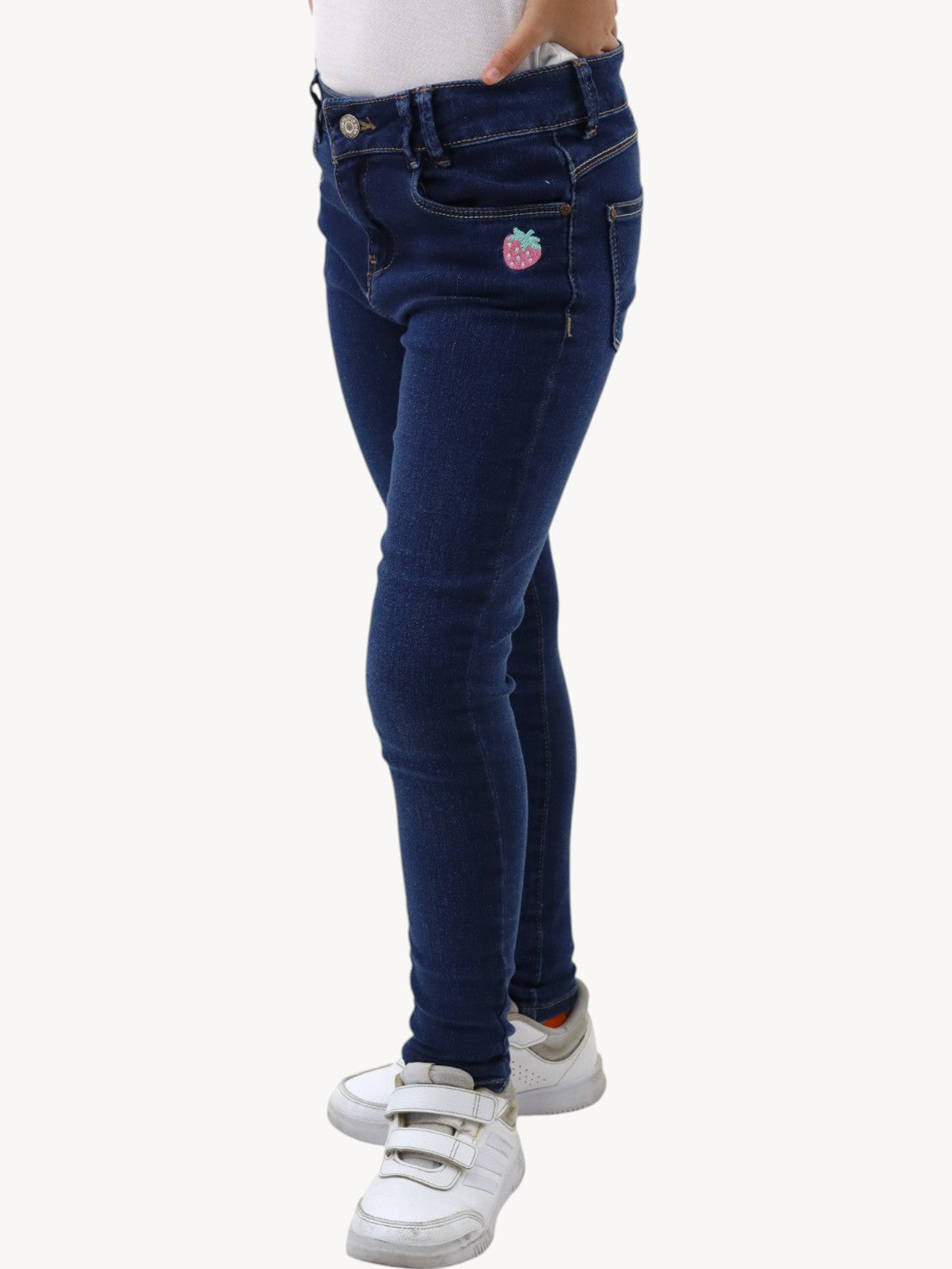 Jeans skinny con bordado de fresa