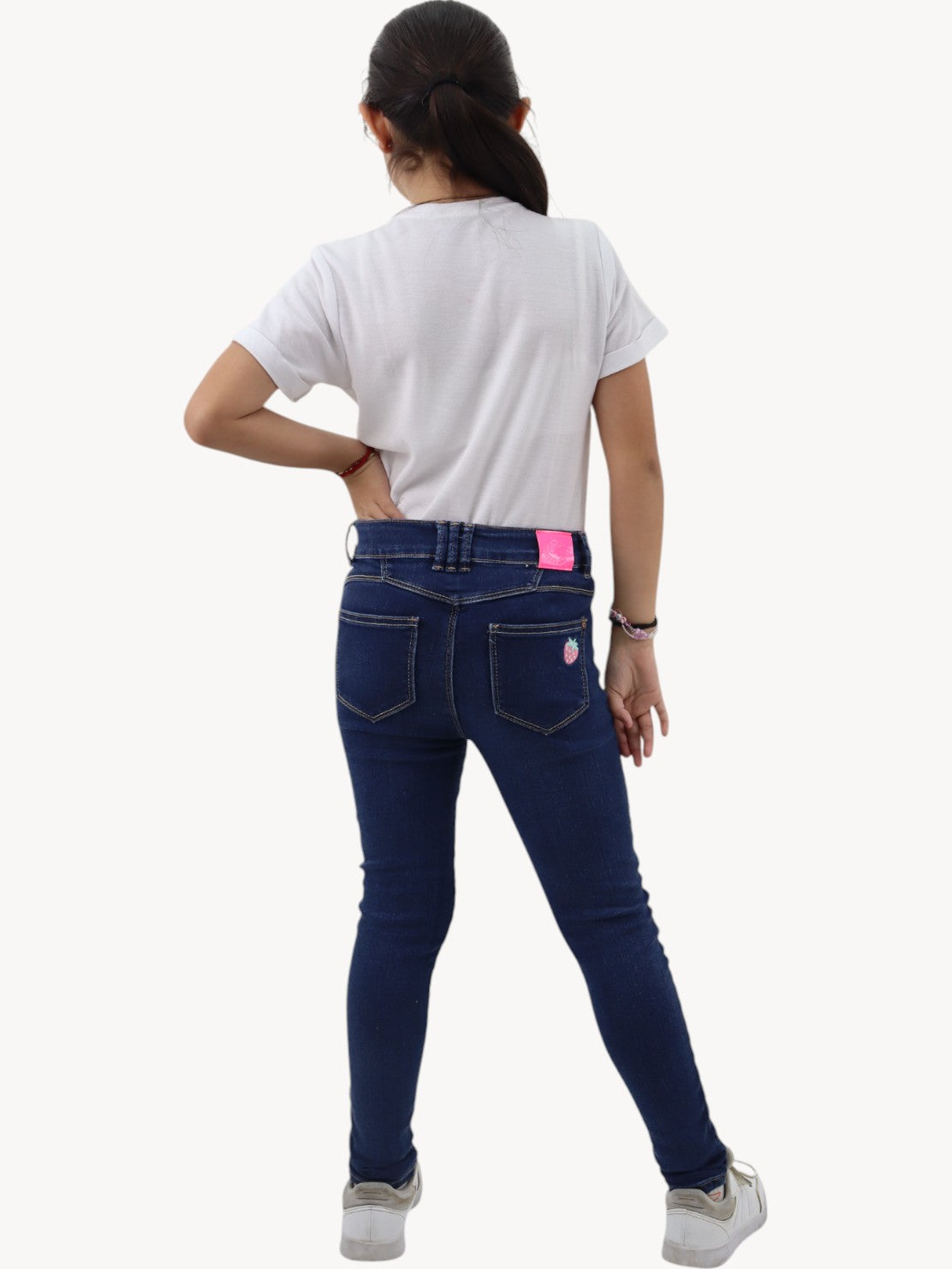 Jeans skinny con bordado de fresa
