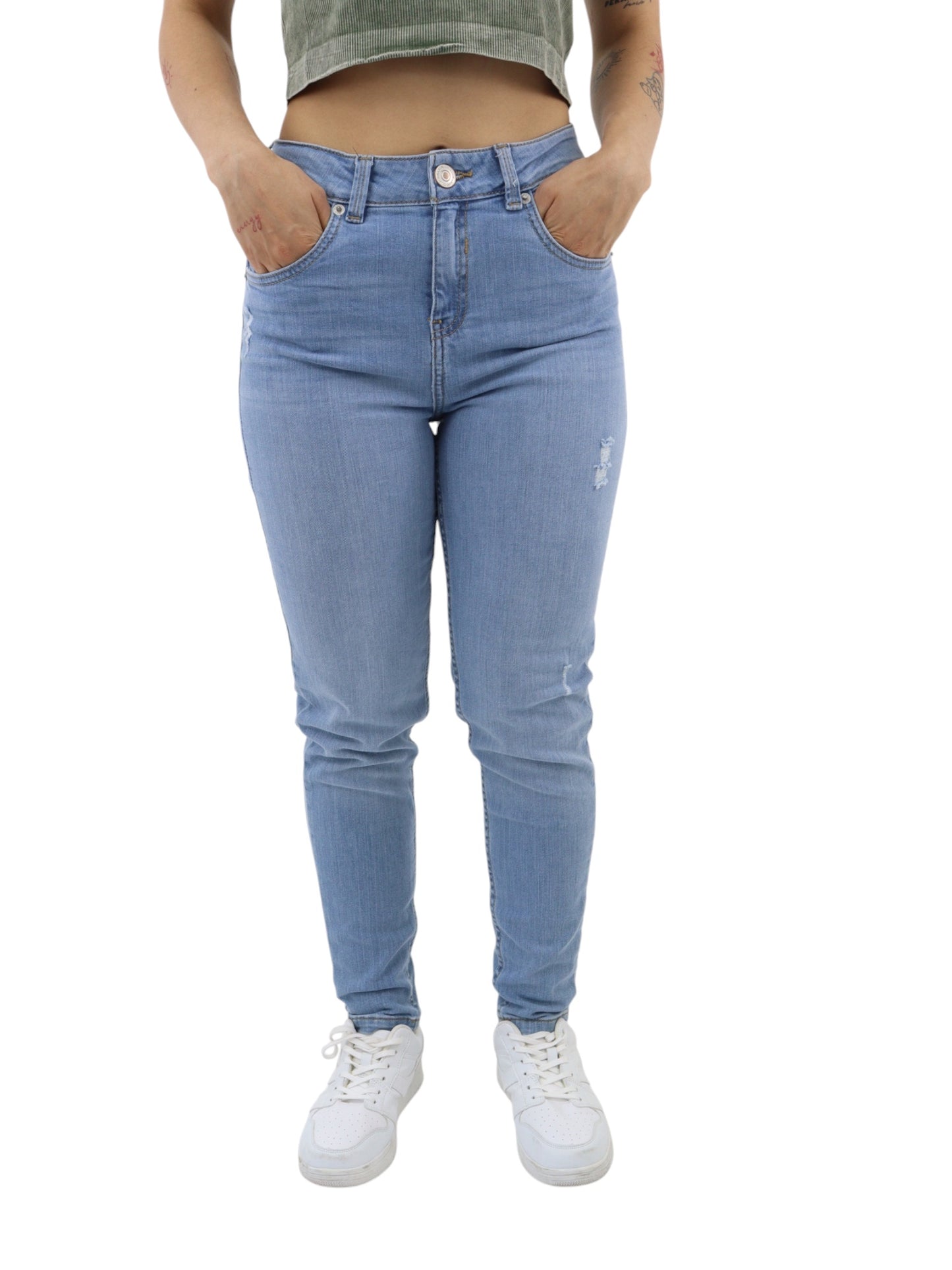 Jeans skinny azul claro con destrucción
