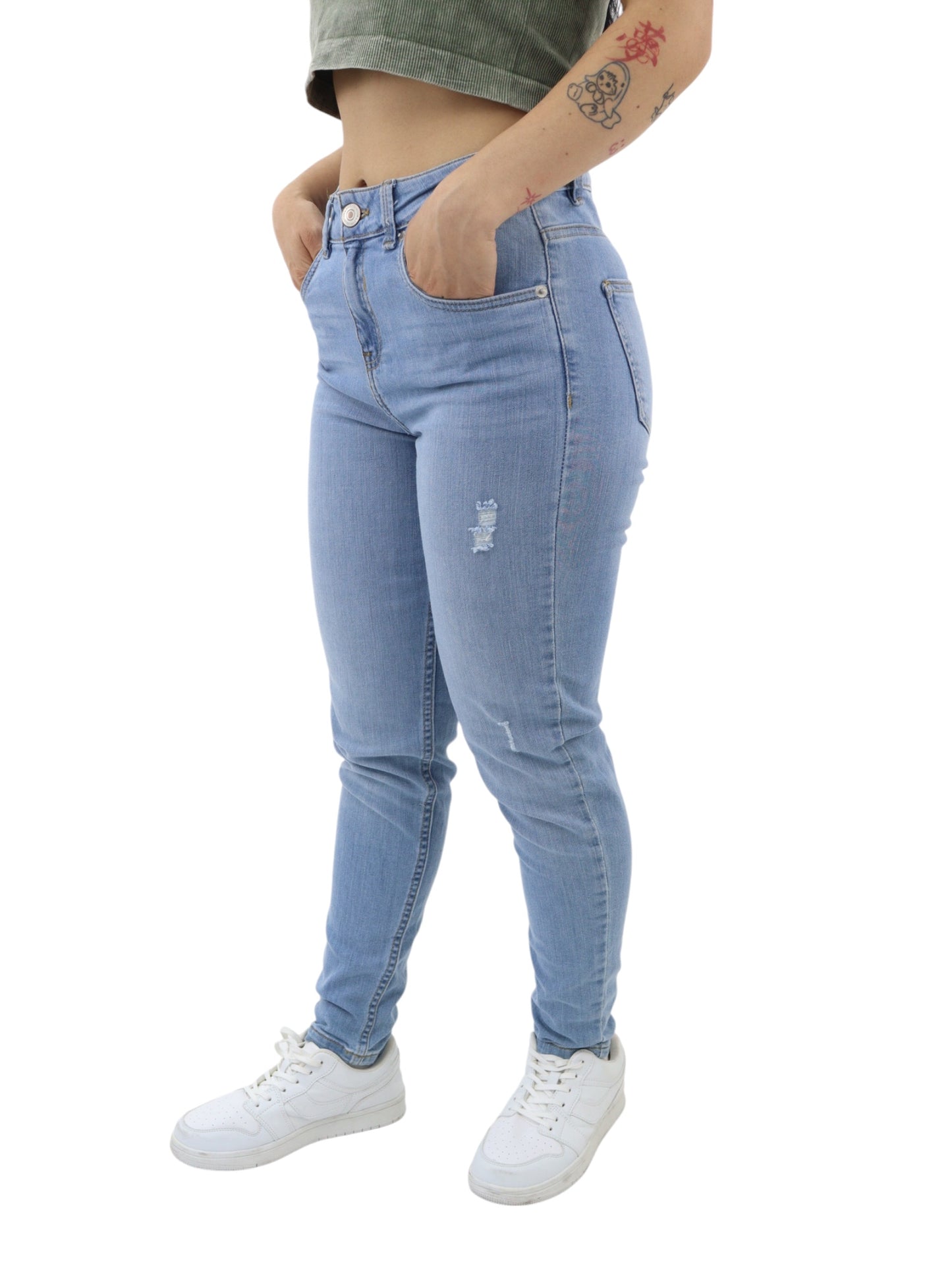 Jeans skinny azul claro con destrucción