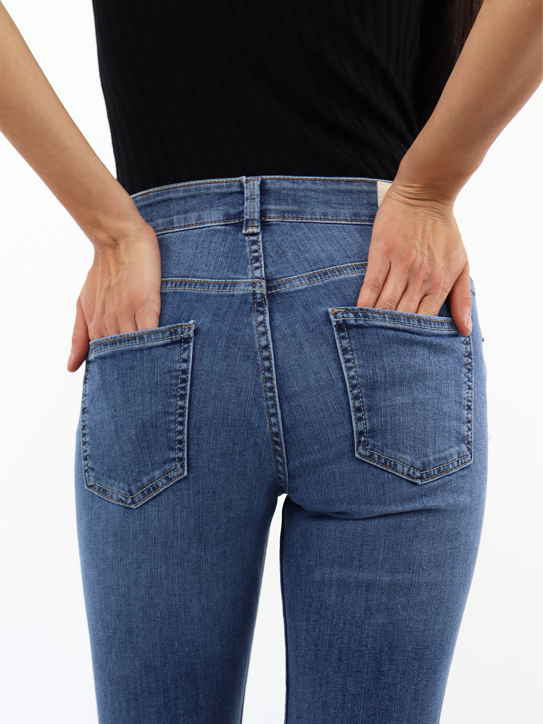 Jeans skinny tiro medio con destrucción