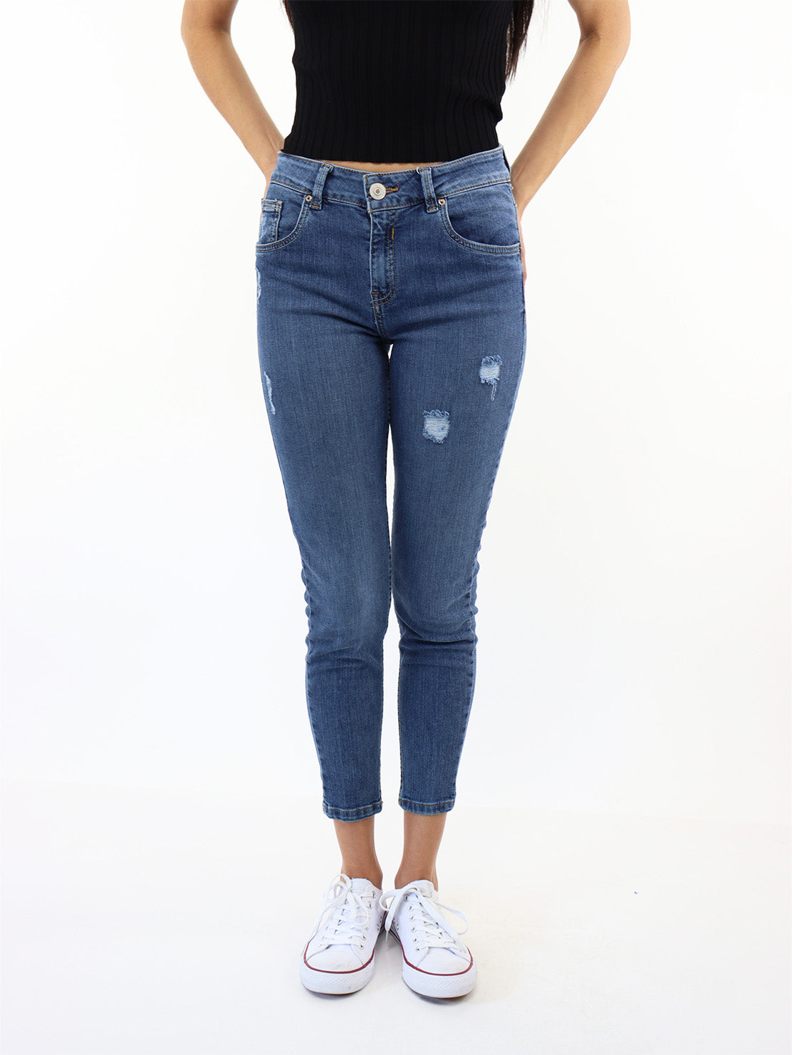 Jeans skinny tiro medio con destrucción