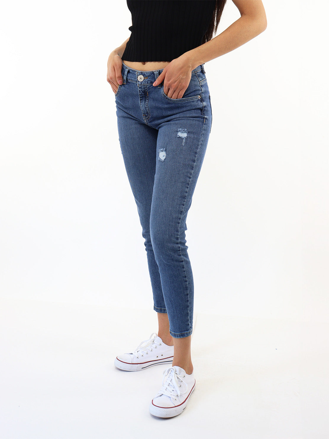 Jeans skinny tiro medio con destrucción