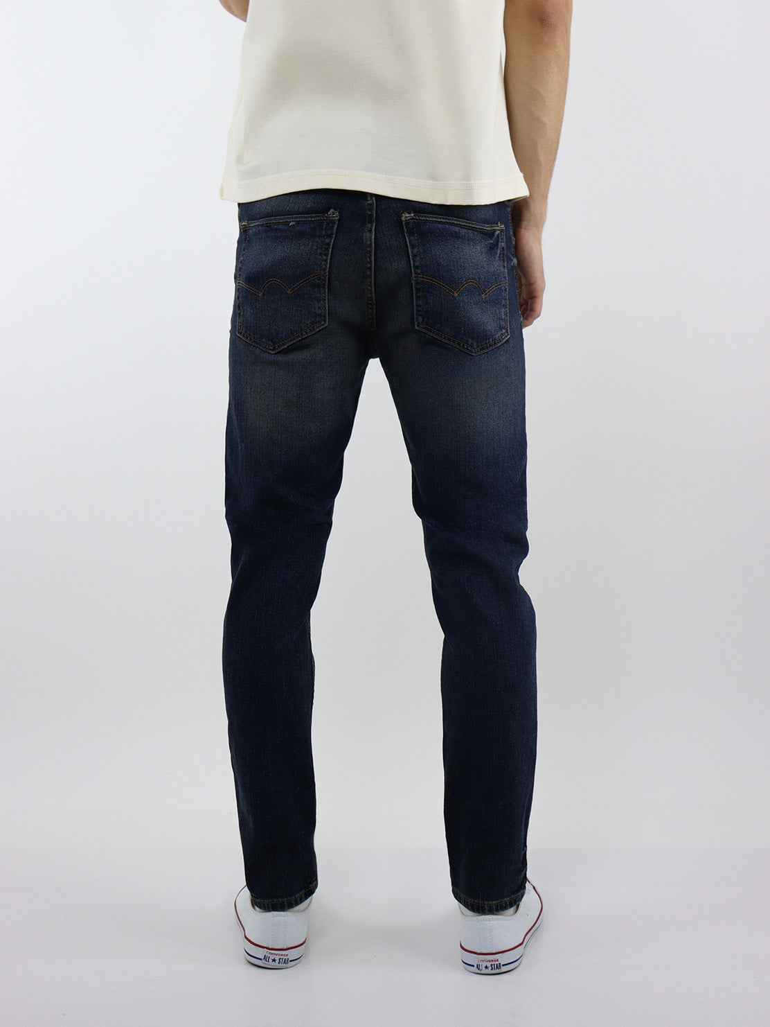 Jeans skinny azul con tinta