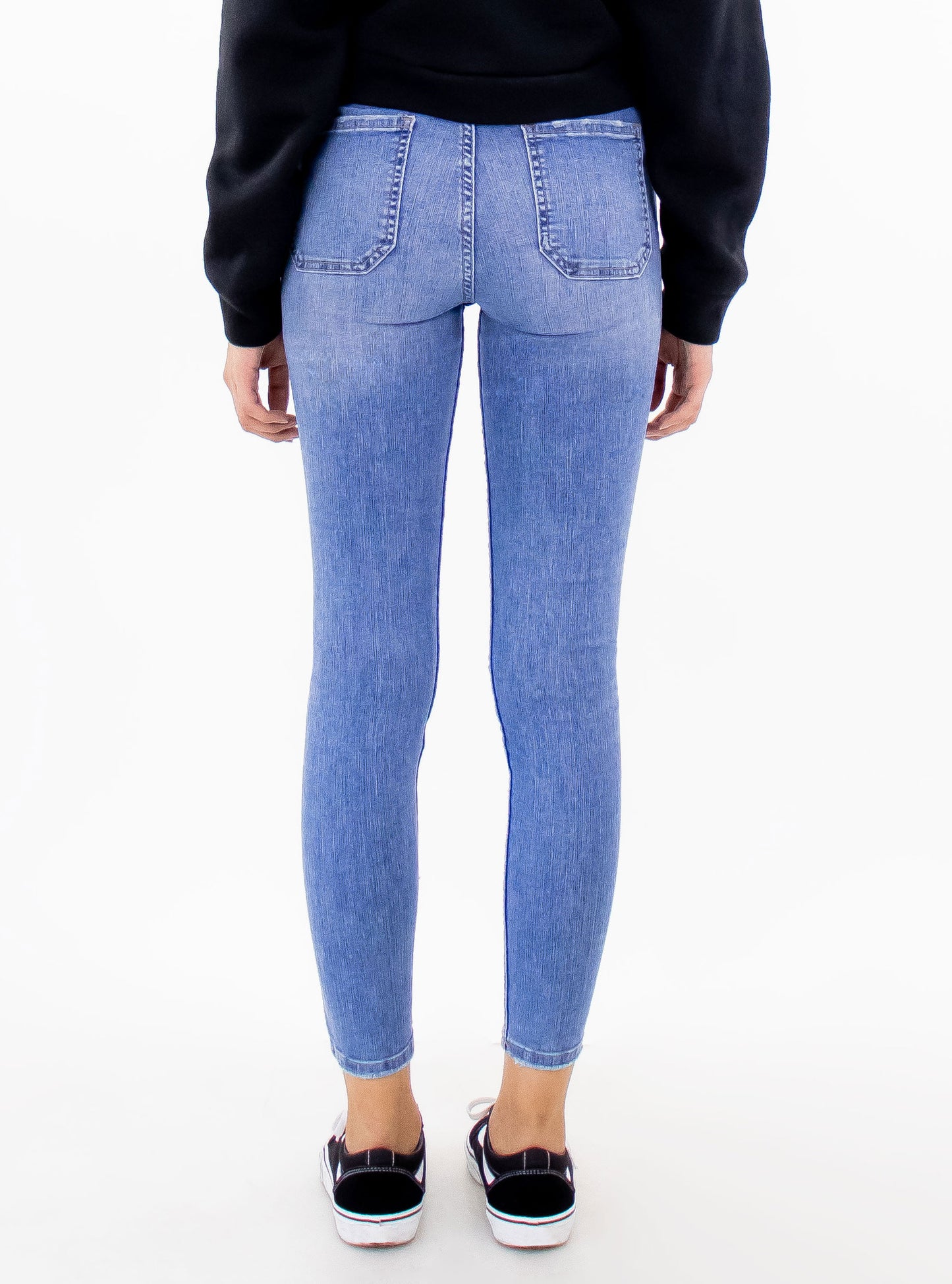 Jeans skinny tiro alto de color azul medio