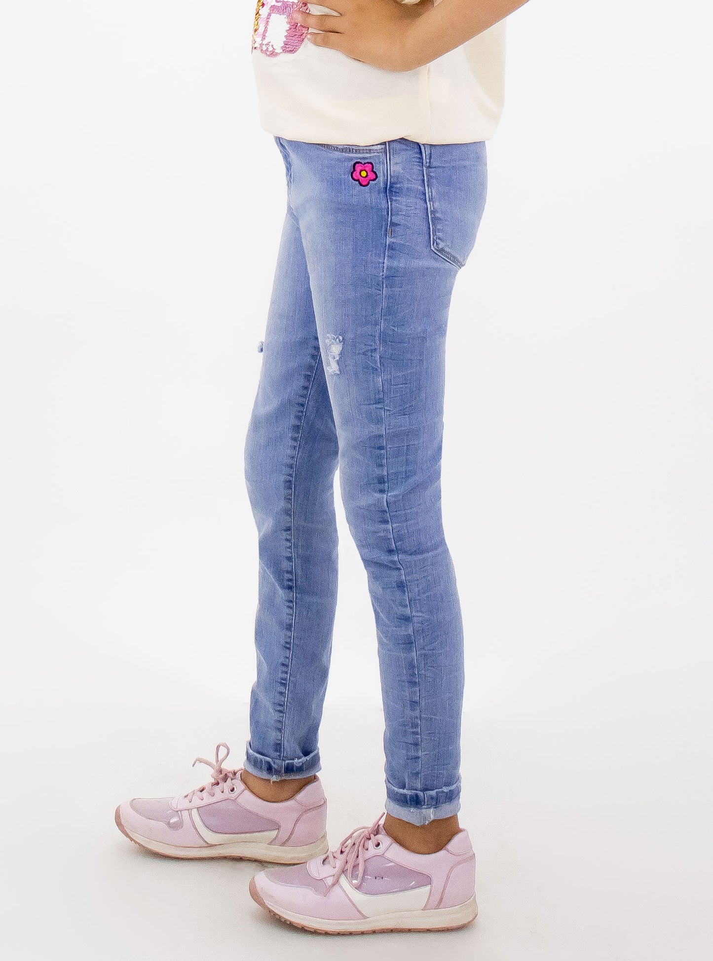 Jeans skinny con bordado floral
