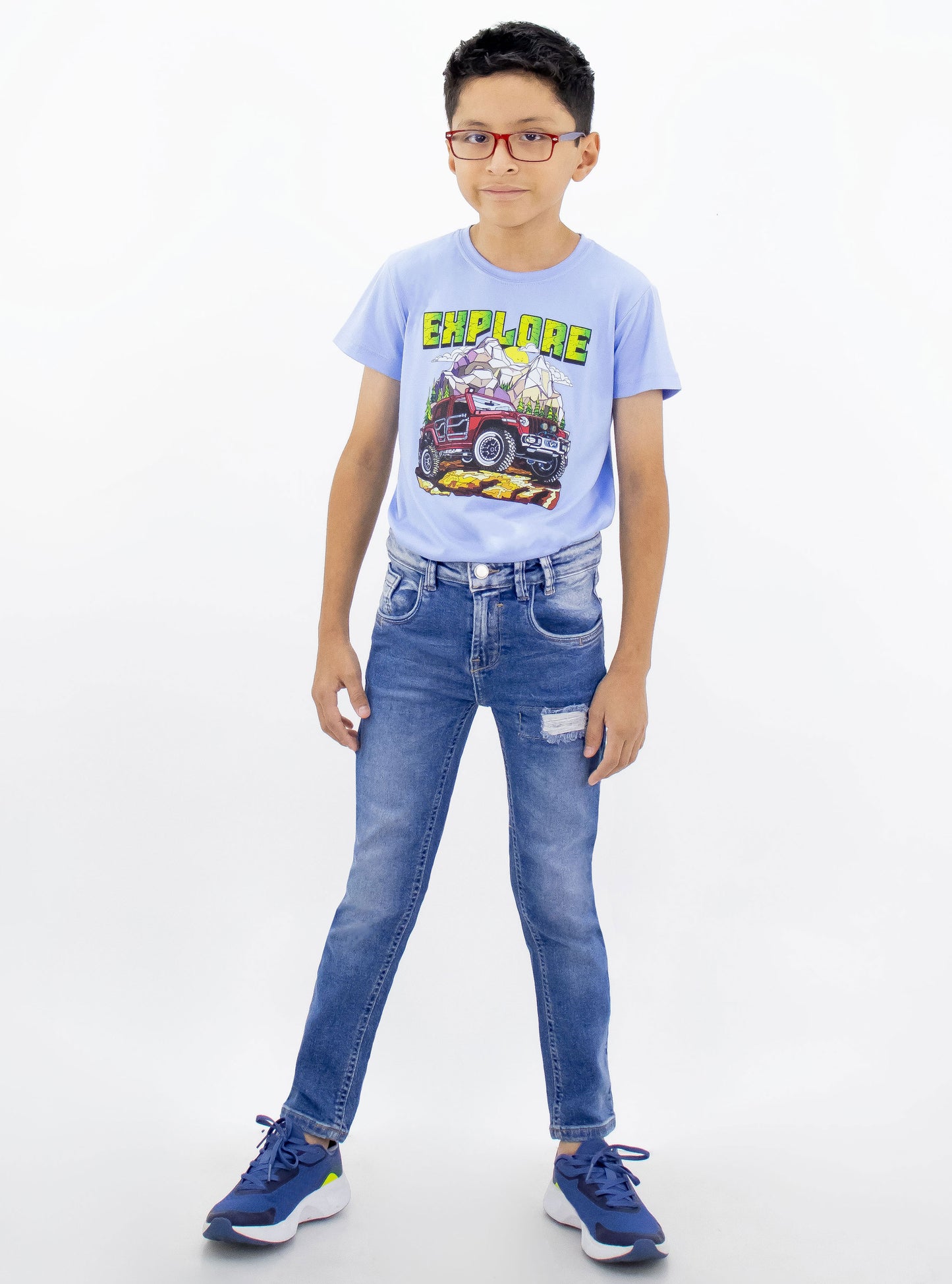Jeans skinny de mezclilla stretch color azul medio con destrucción