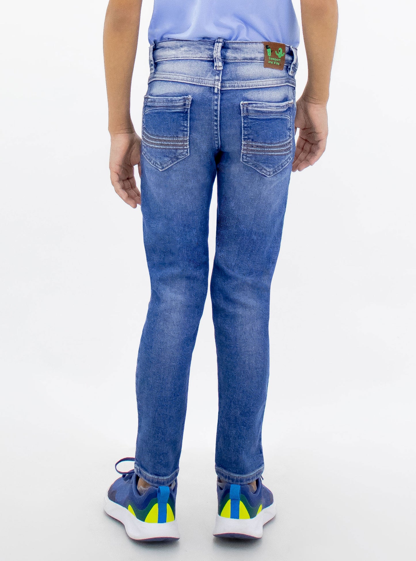 Jeans skinny de mezclilla stretch color azul medio con destrucción