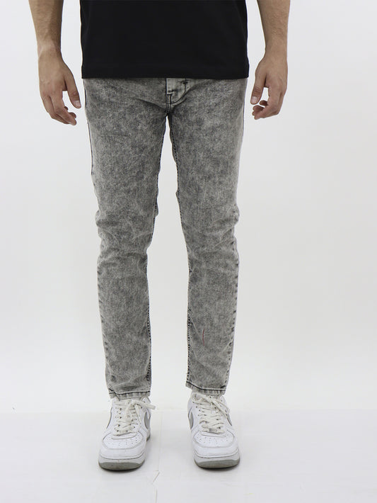 Vaquero skinny fit gris con snow