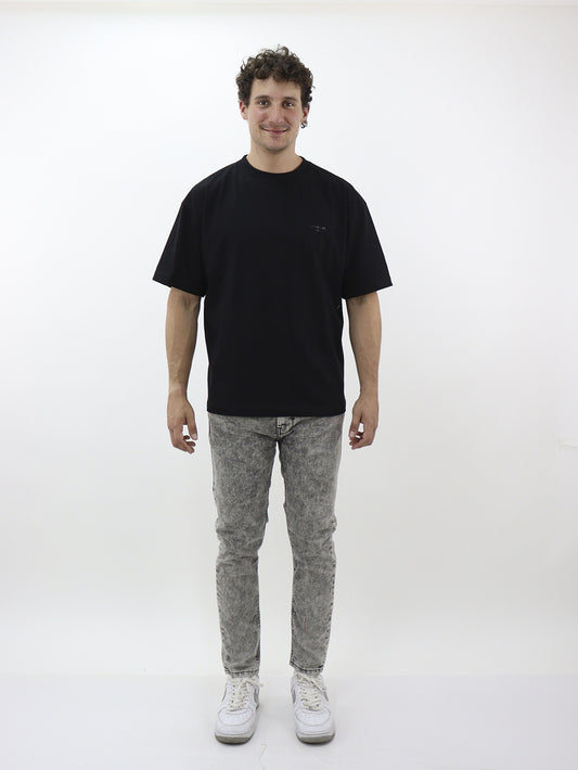 Vaquero skinny fit gris con snow