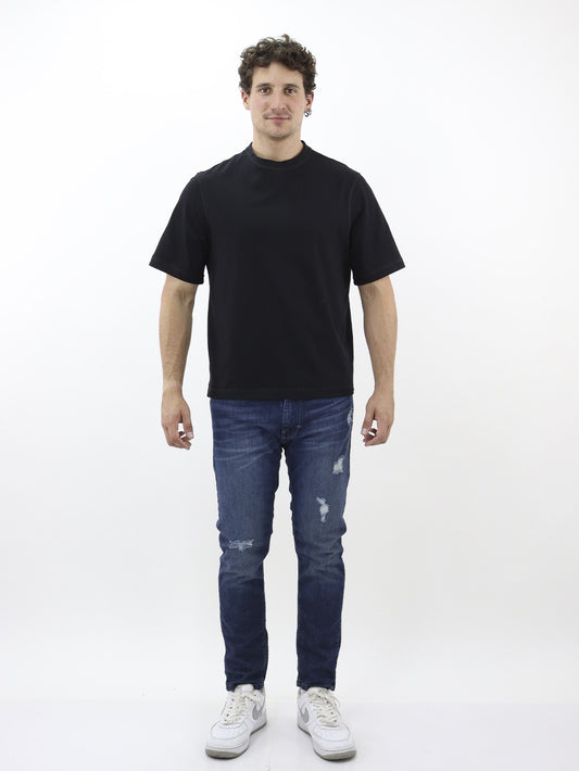 Jeans skinny fit con destrucción