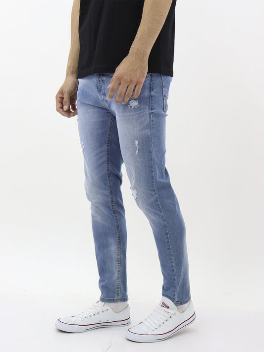 Jeans skinny fit con destrucción