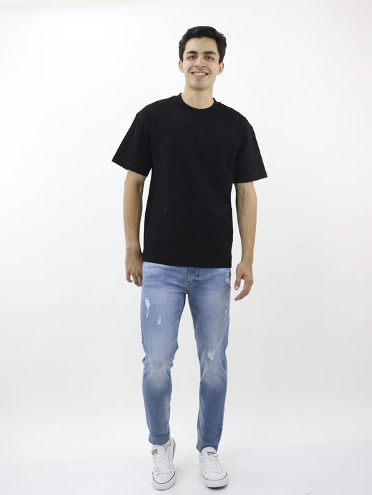 Jeans skinny fit con destrucción
