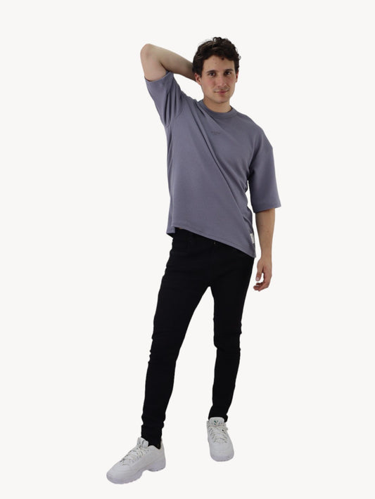 Jeans skinny negro jaspeado