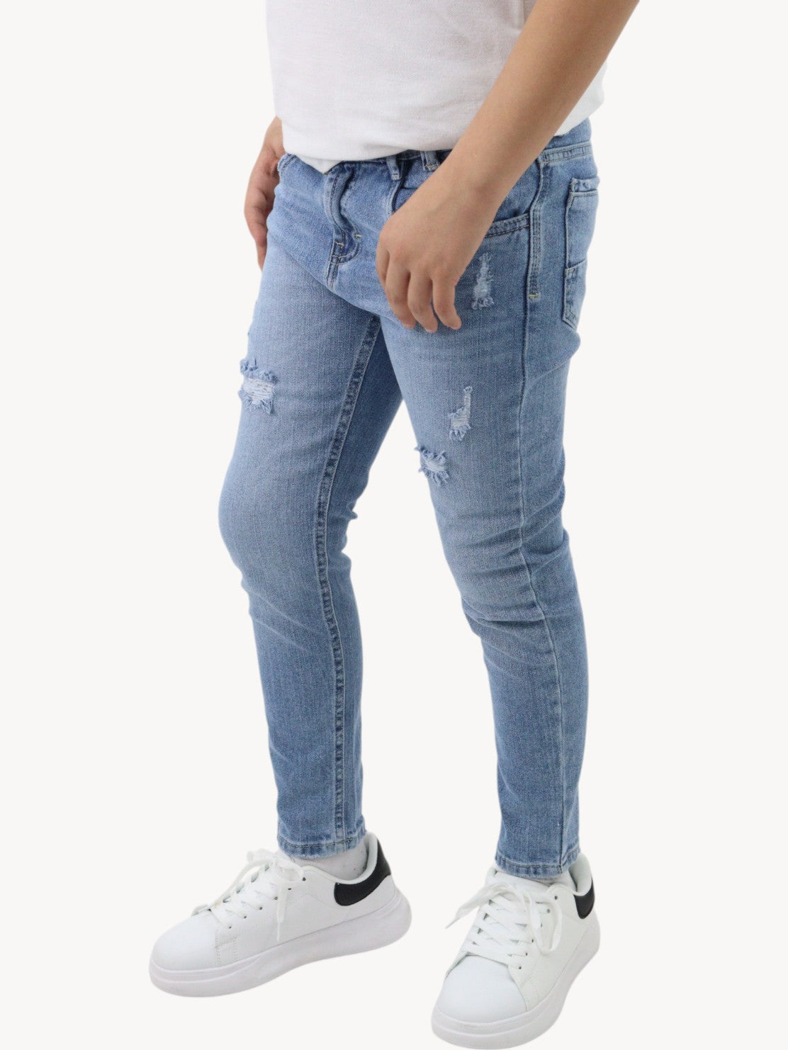 Vaquero slim fit con destrucción