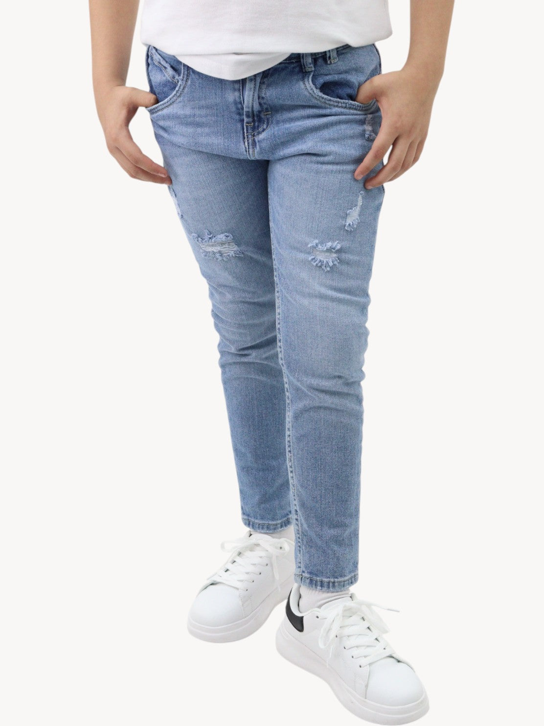 Vaquero slim fit con destrucción