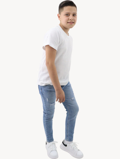 Vaquero slim fit con destrucción