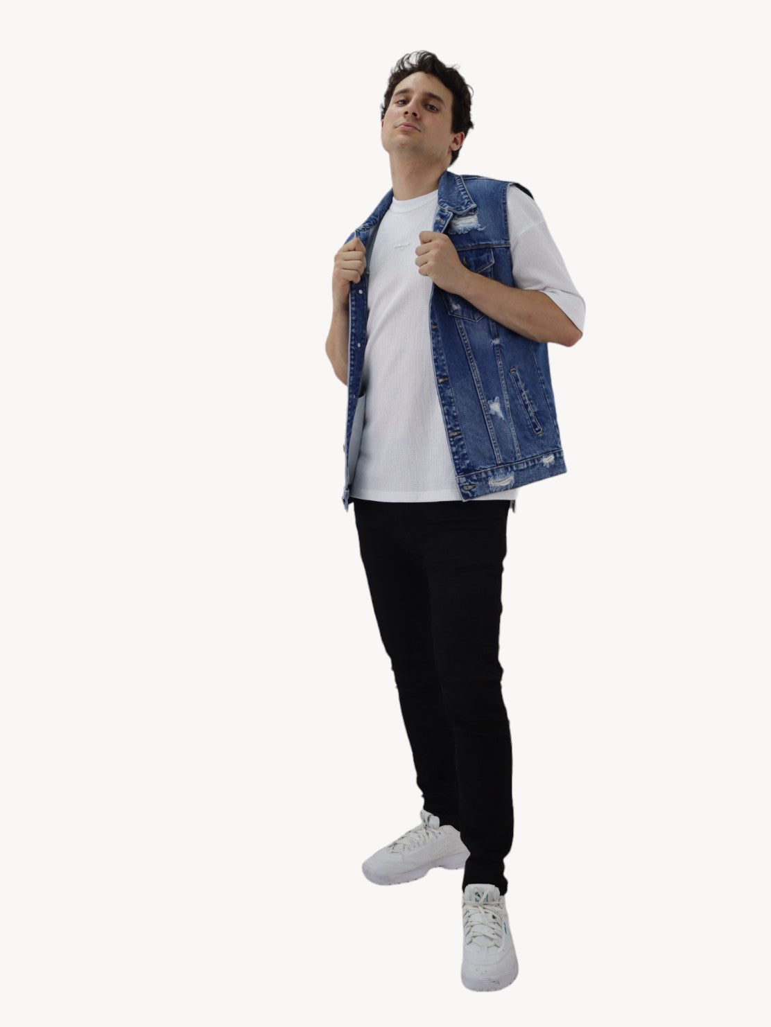 Chaleco denim de color azul oscuro con destrucción