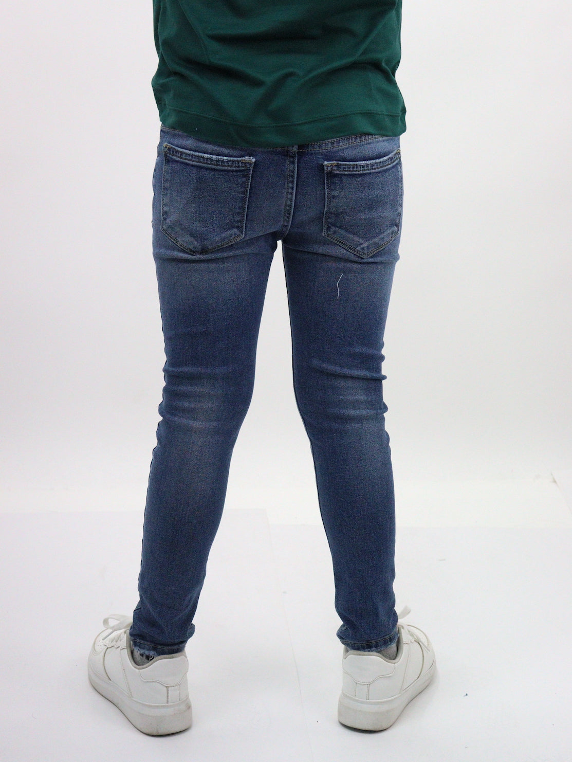 Jeans skinny de color azul deslavado