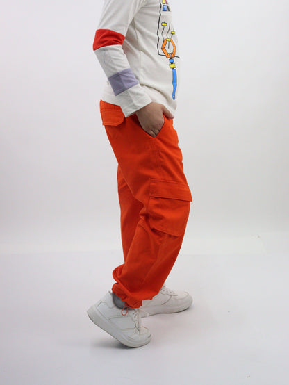 Pantalón parachute de color naranja