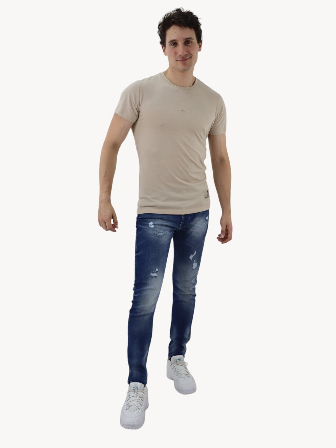 Jeans skinny azul oscuro con destrucción
