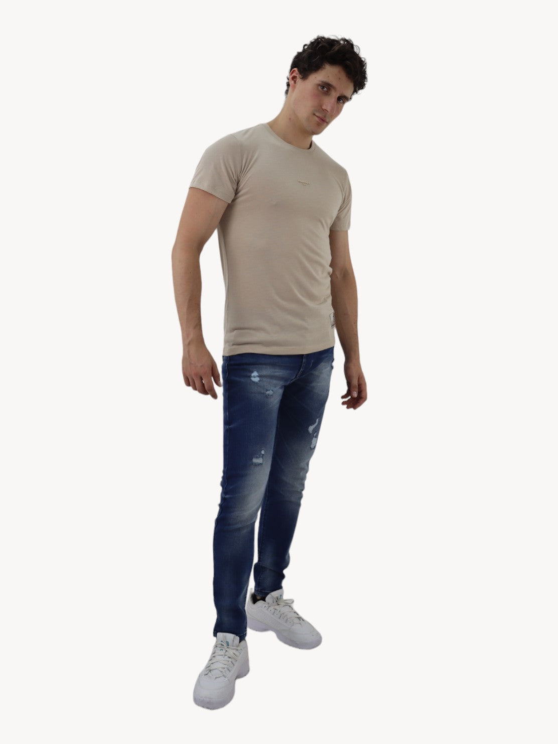 Jeans skinny azul oscuro con destrucción