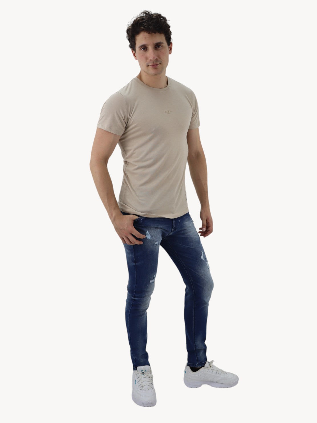 Jeans skinny azul oscuro con destrucción