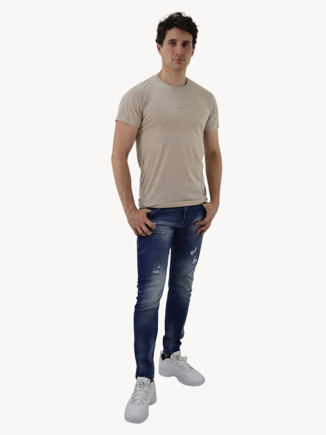 Jeans skinny azul oscuro con destrucción