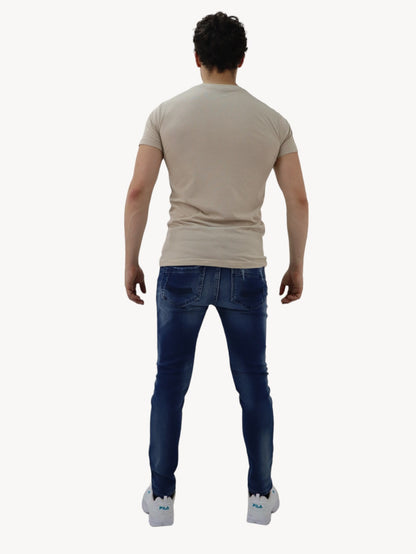 Jeans skinny azul oscuro con destrucción