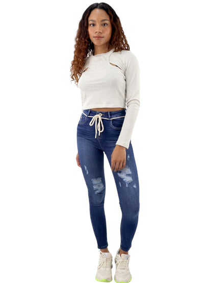 Jeans skinny tiro alto con destrucción