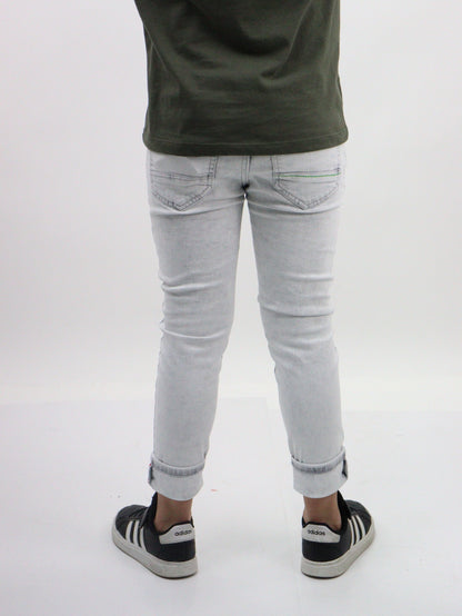 Jeans skinny gris claro con snow
