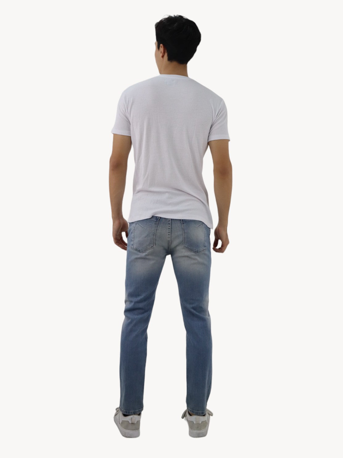 Jeans estilo slim/skinny deslavado con destrucción