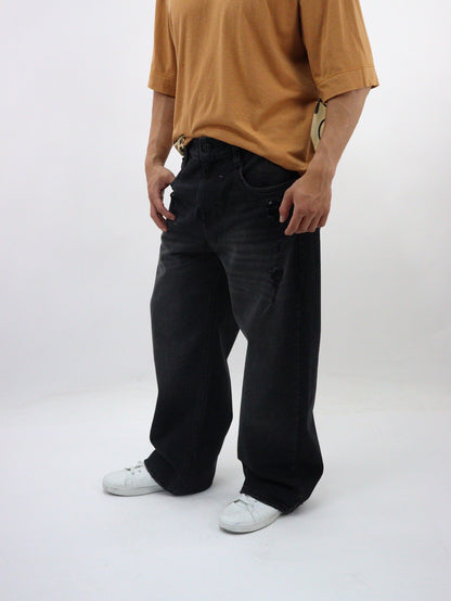 Jeans baggy de mezclilla rígida color negro deslavado (NUEVA TEMPORADA)