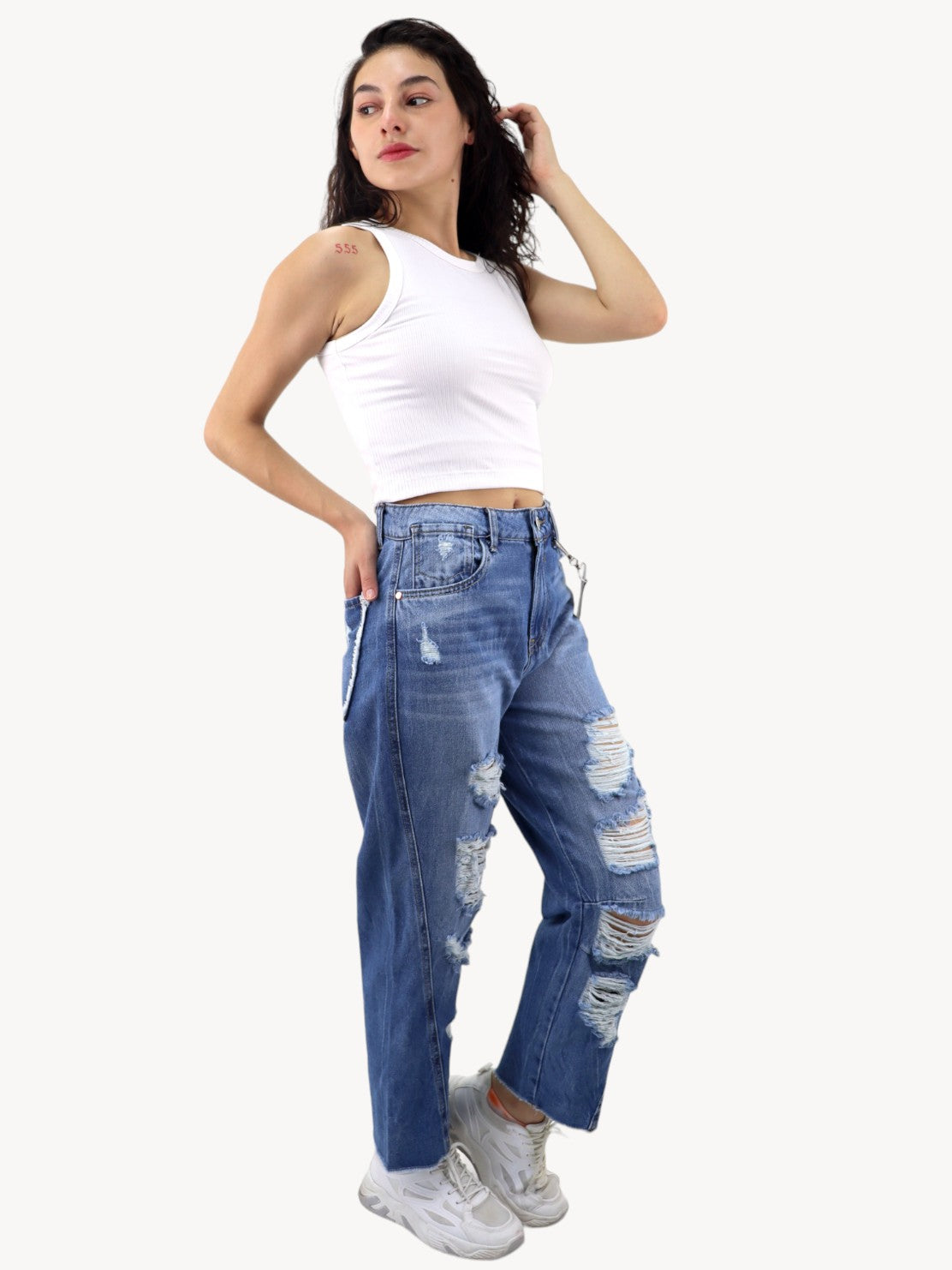 Jeans mom amplio azul medio con destrucción