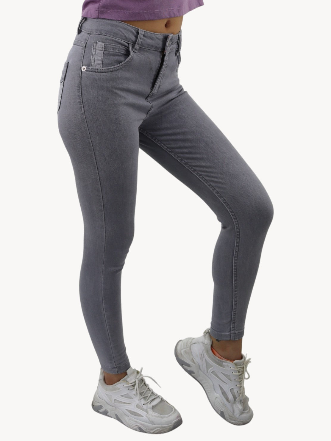Jeans skinny tiro alto de color gris
