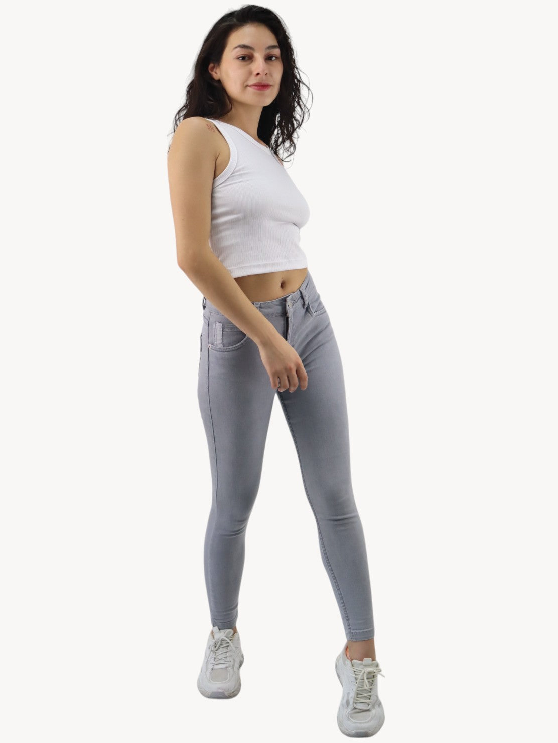 Jeans skinny tiro alto de color gris