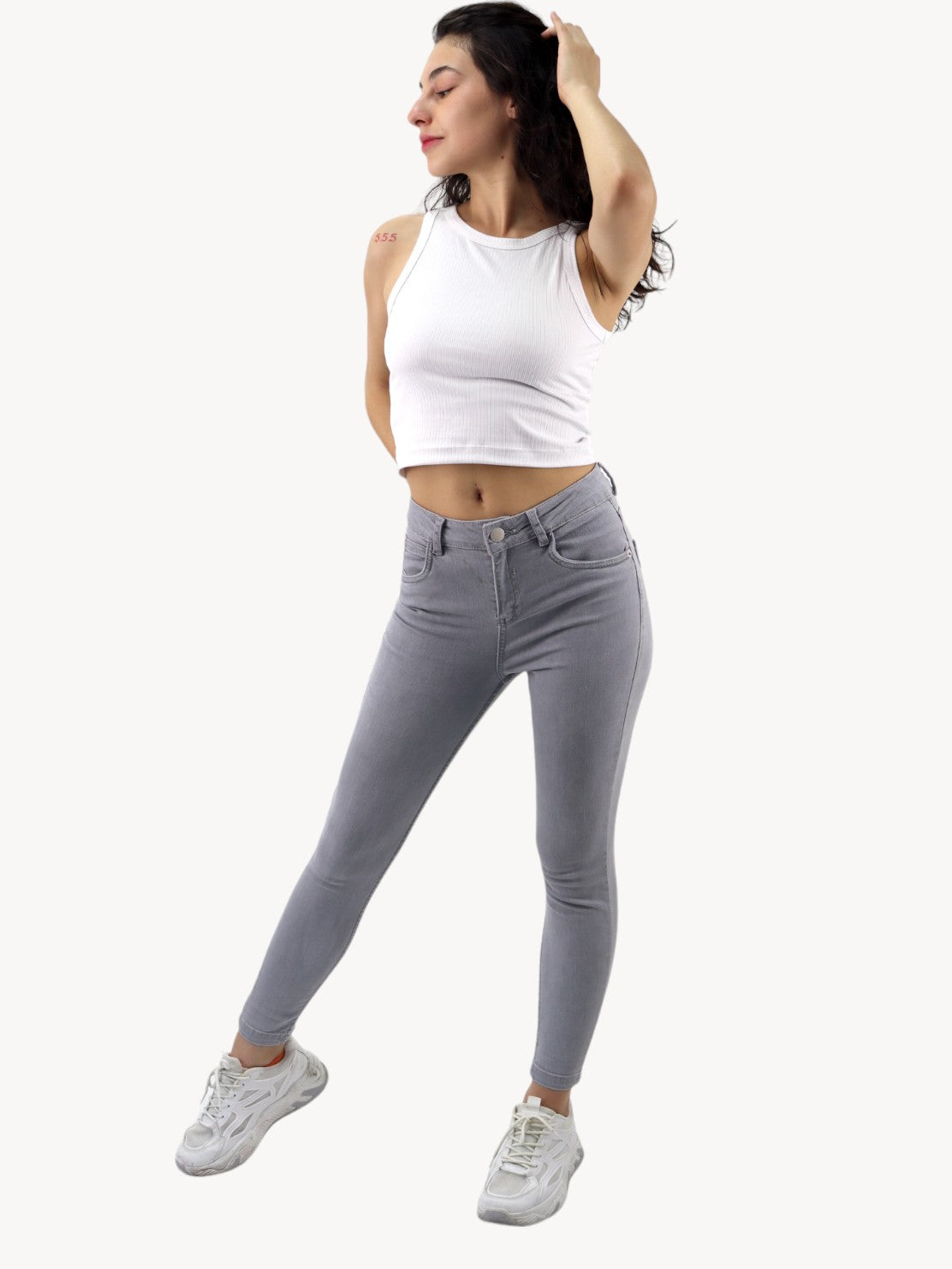 Jeans skinny tiro alto de color gris
