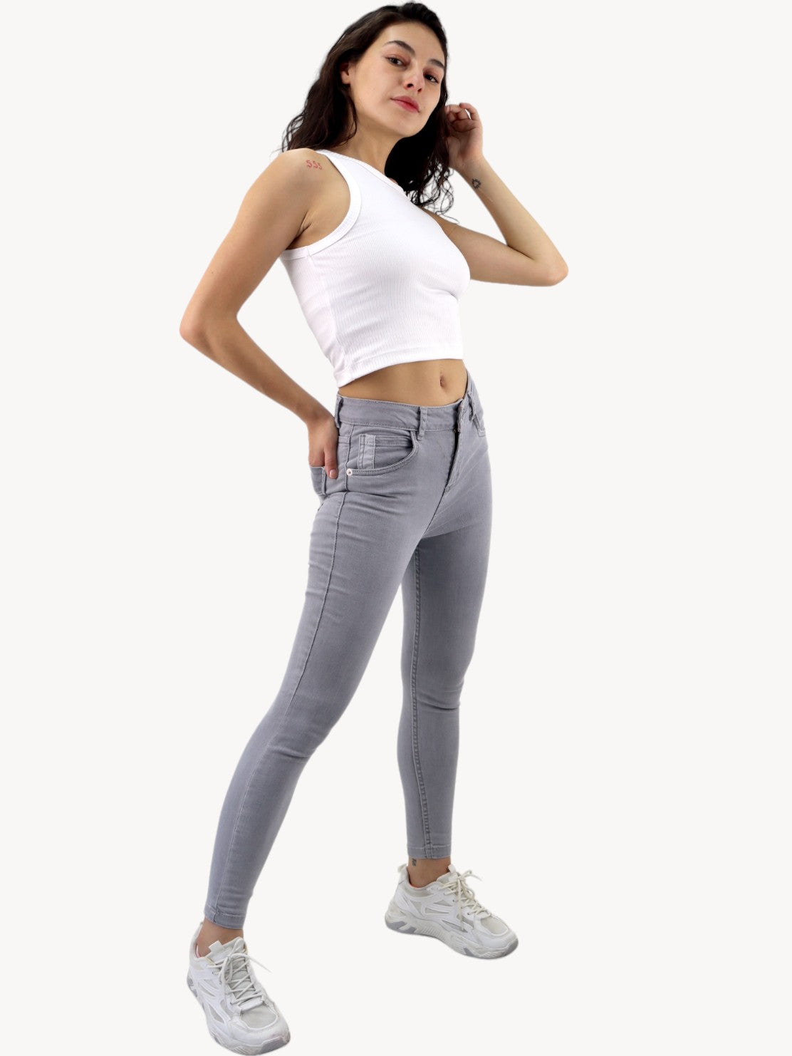 Jeans skinny tiro alto de color gris