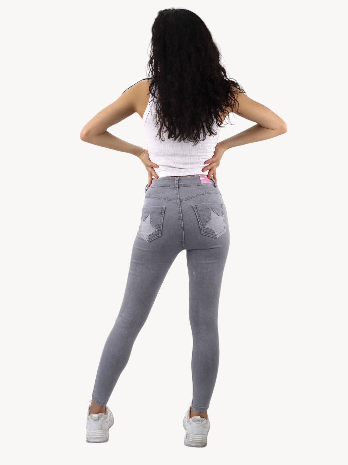 Jeans skinny tiro alto de color gris