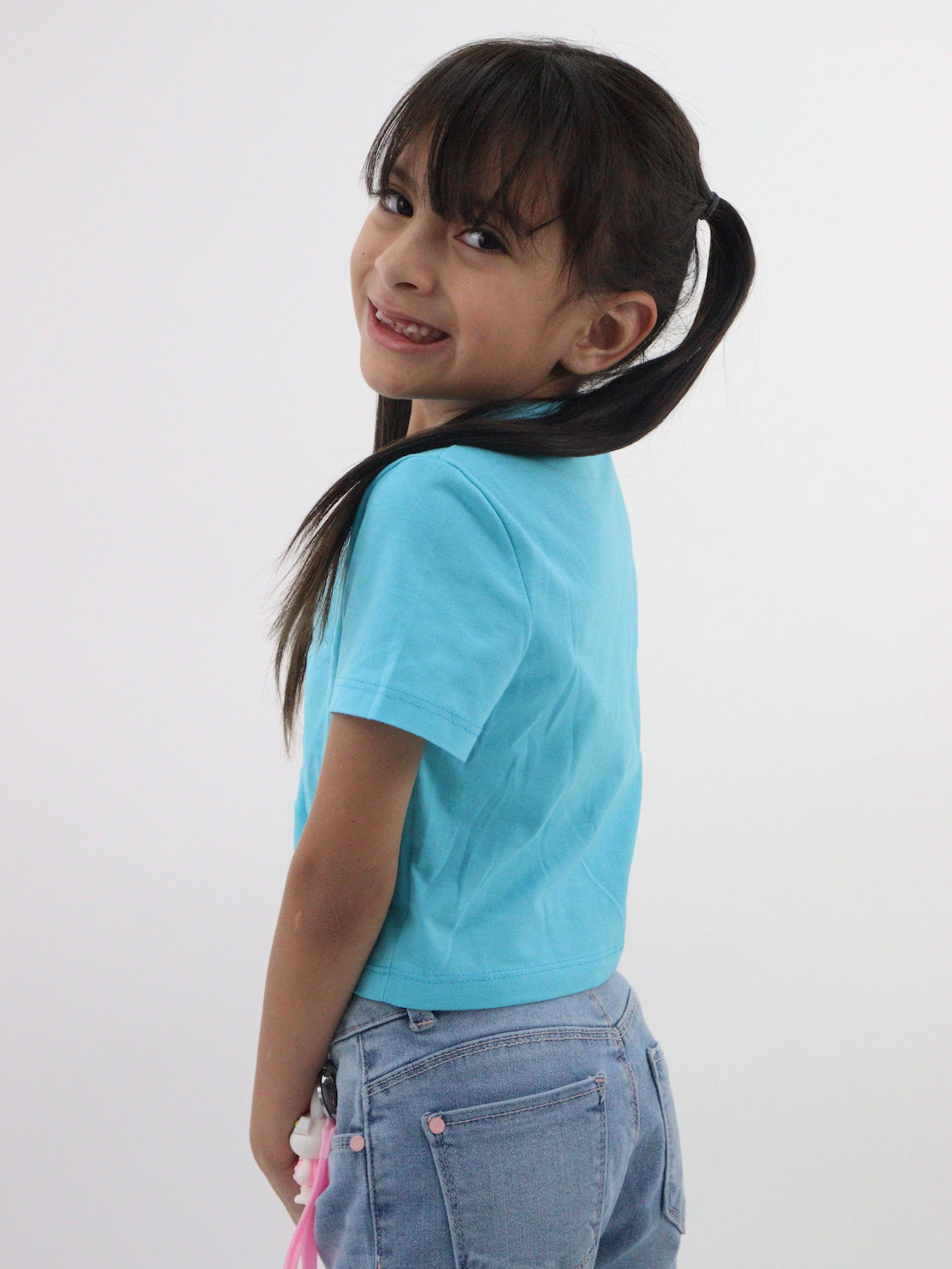 Playera fruncida de color azul turquesa