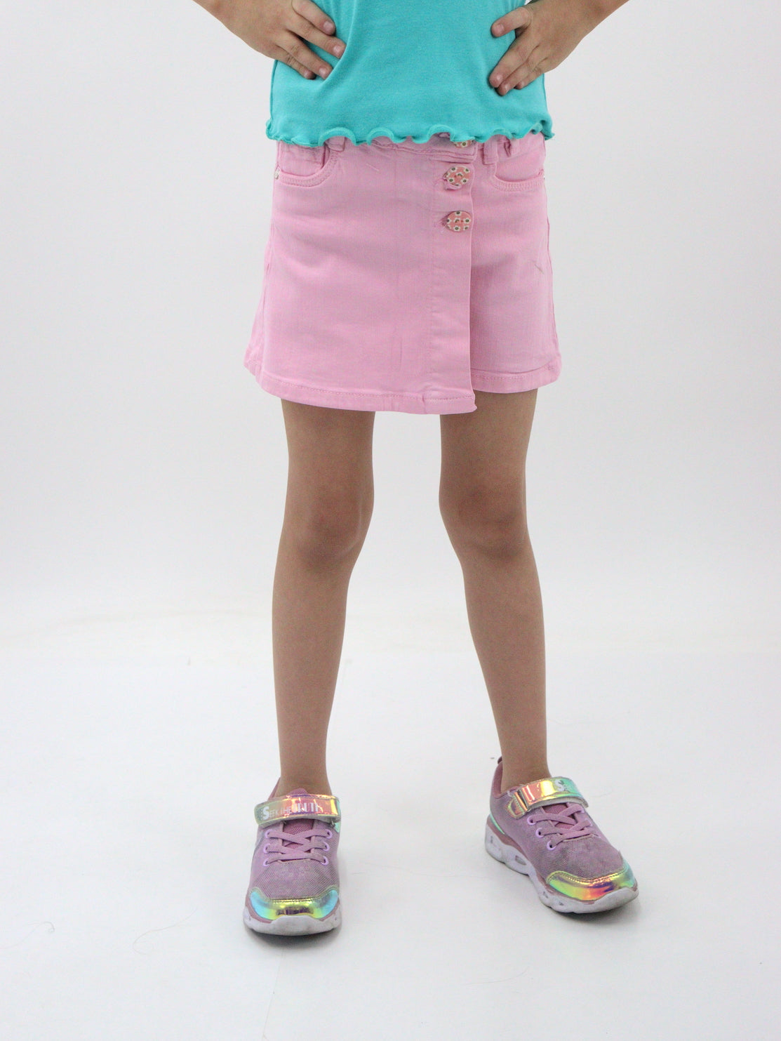 Short falda de color rosa