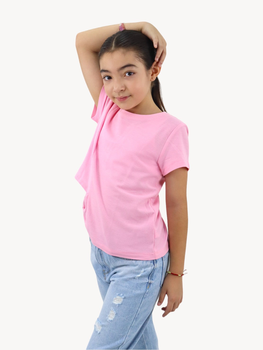 Playera manga corta color rosa con detalle de moño