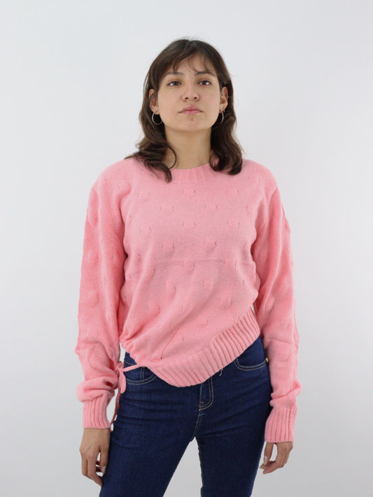 Suéter tejido de color rosa