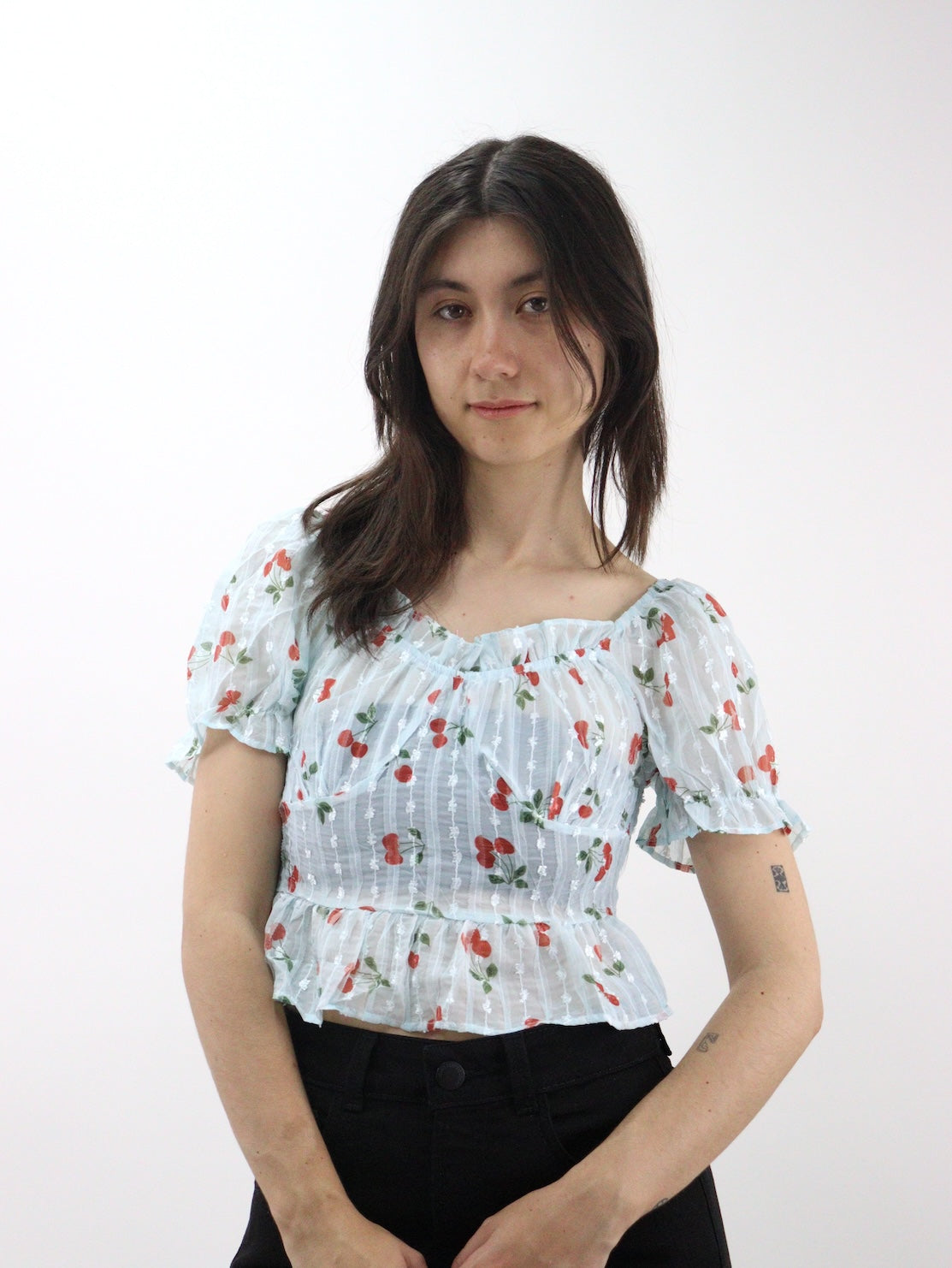 Blusa de manga abullonada fruncida con estampado