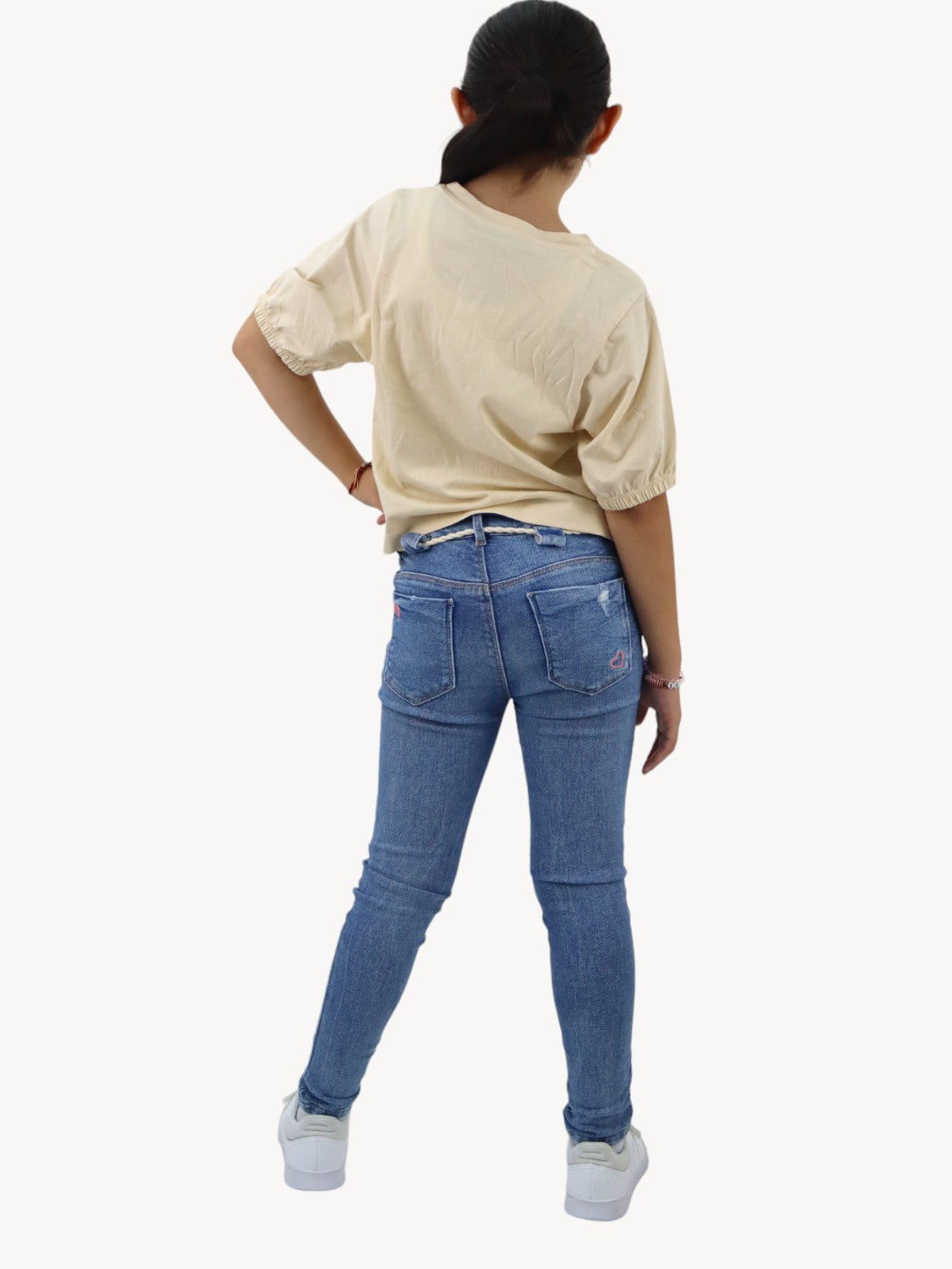 Jeans skinny con destrucción azul medio
